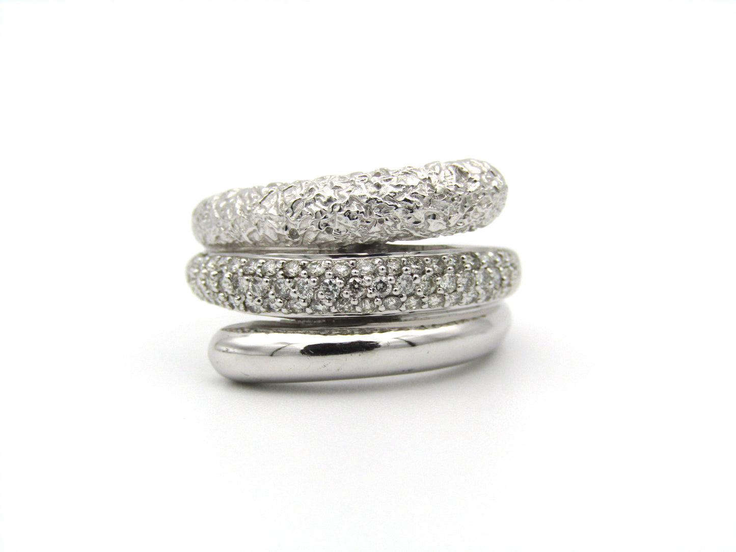 9K gold diamond swirl ring.
