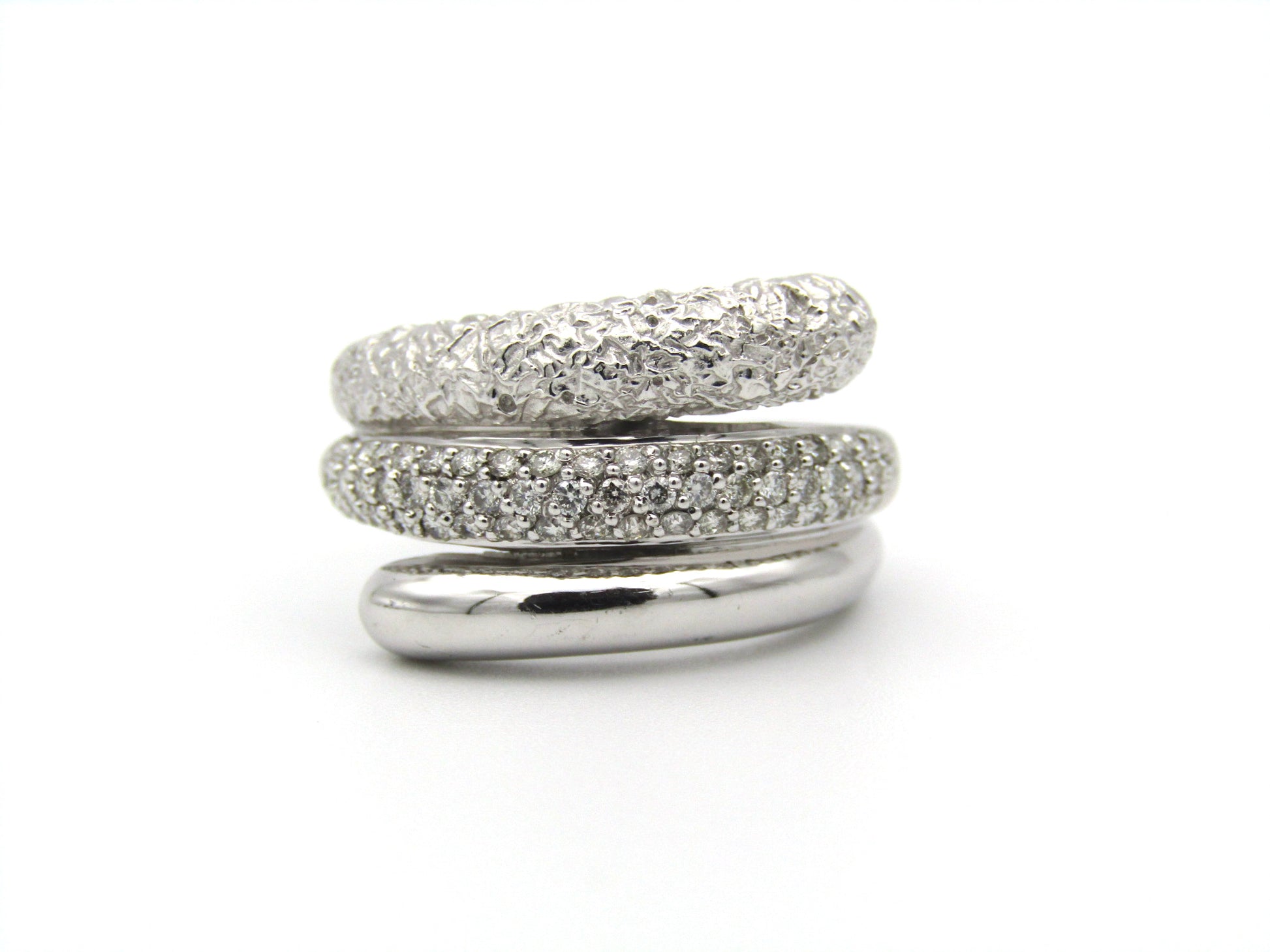 9K gold diamond swirl ring.