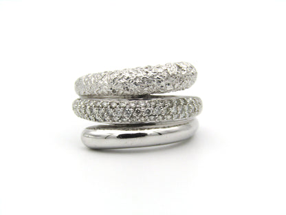 9K gold diamond swirl ring.