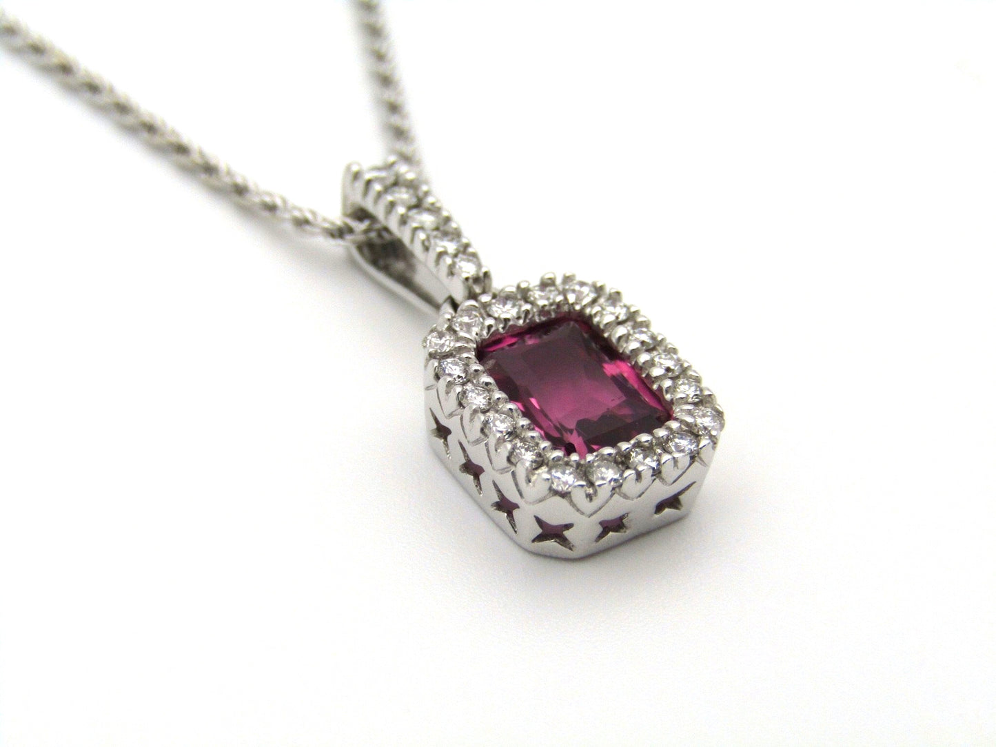 14kt white gold Pink Tourmaline and diamonds pendant.
