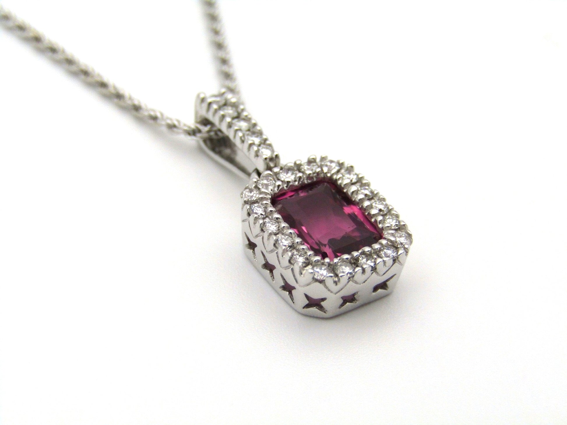14kt white gold Pink Tourmaline and diamonds pendant.