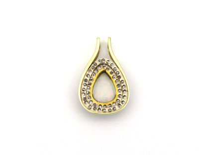 18K gold opal and diamond pendant.
