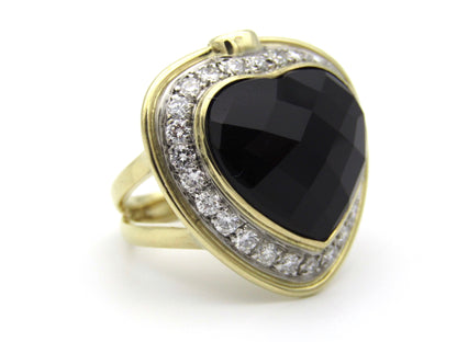 18kt gold amethyst, diamond, and ruby ring.