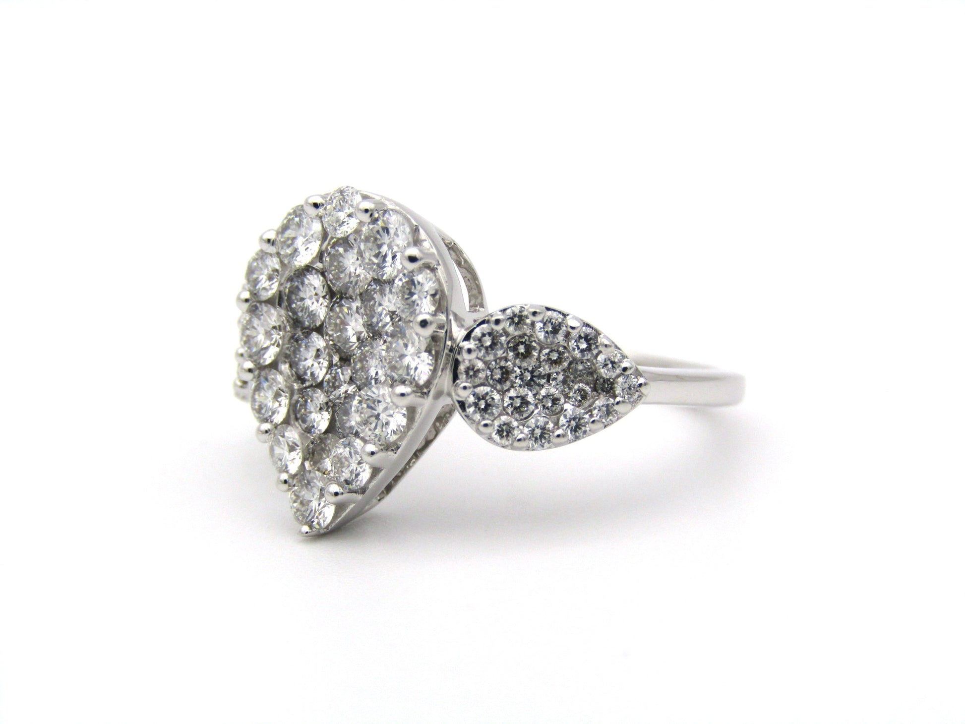 18K gold diamond cluster ring.