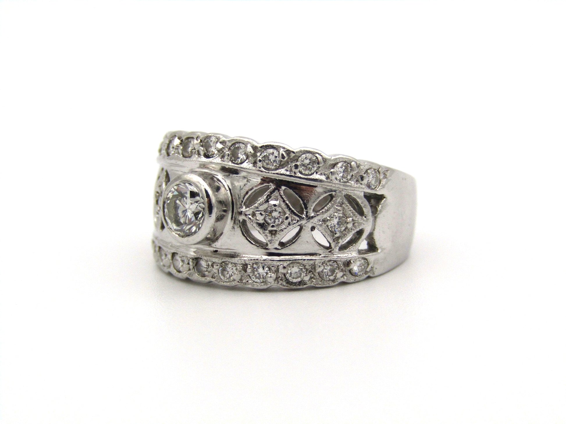 18kt gold diamond ring by Jenna Clifford.
