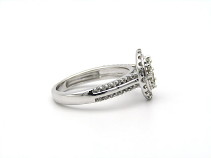 14K gold diamond ring.