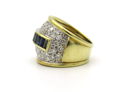 18K gold sapphire and diamond dress ring.
