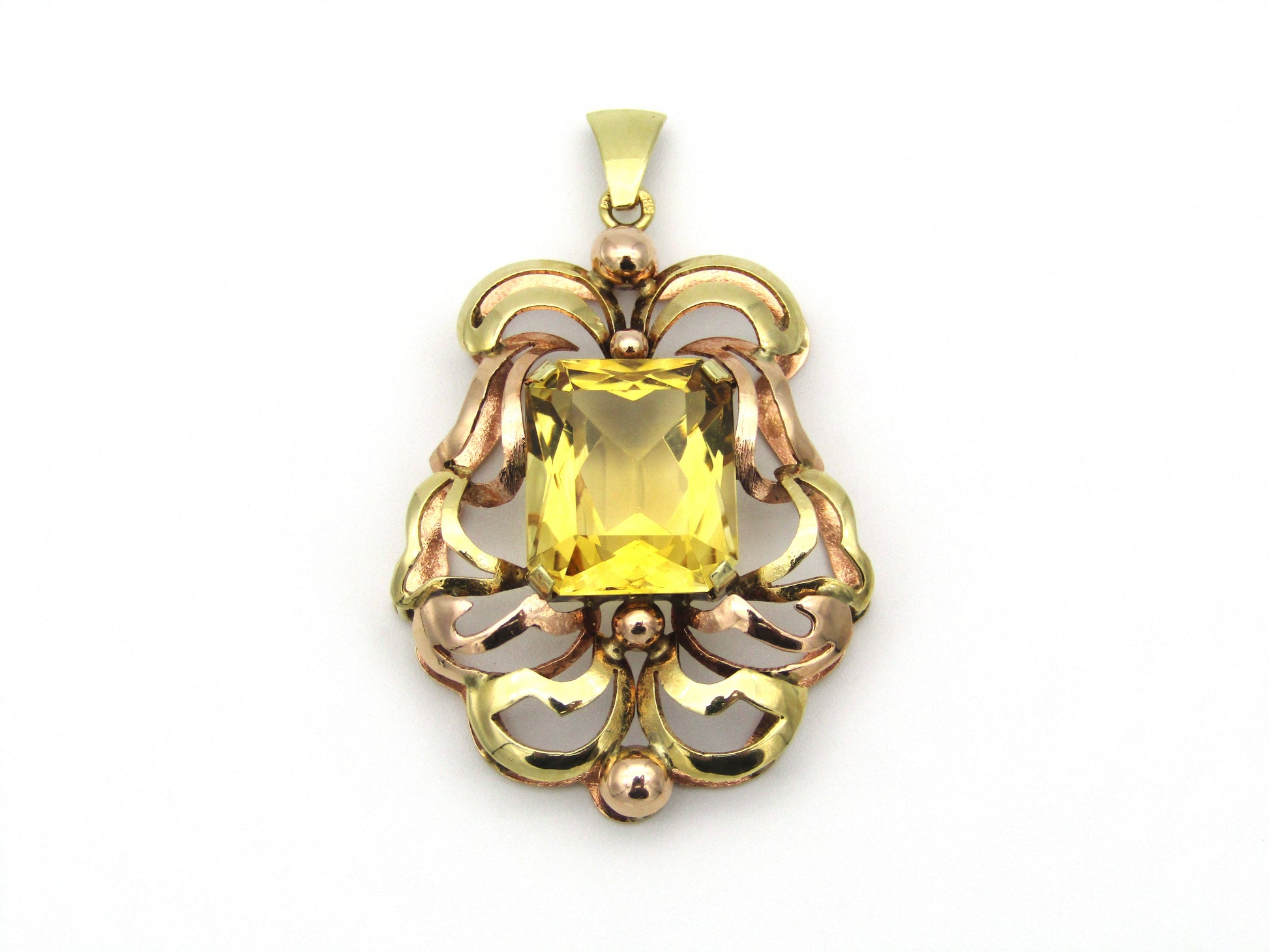 14kt yellow and rose gold citrine pendant.