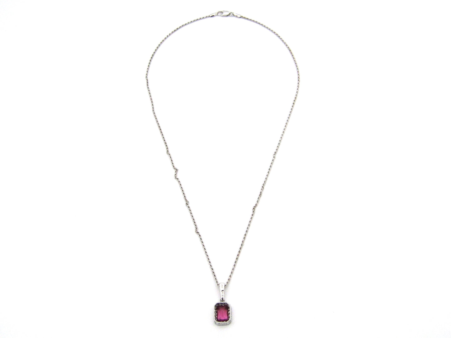 14kt white gold Pink Tourmaline and diamonds pendant.