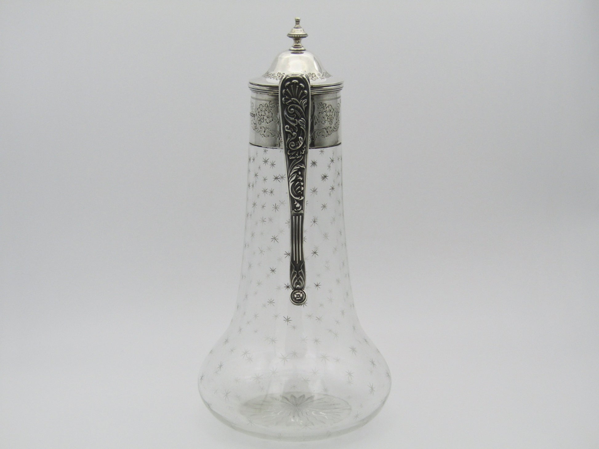 Sterling silver mounted cut glass claret jug by Thomas Henry Blake, Sheffield 1913.