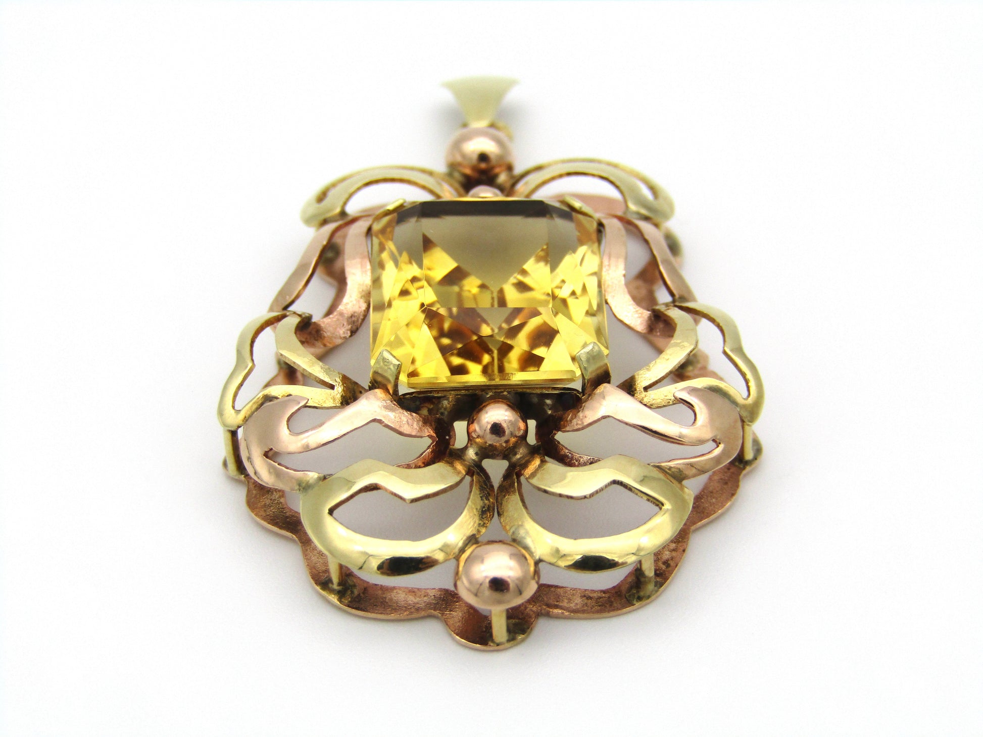 14kt yellow and rose gold citrine pendant.