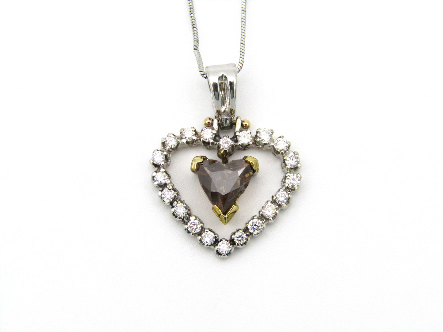 18kt gold cognac diamond pendant.