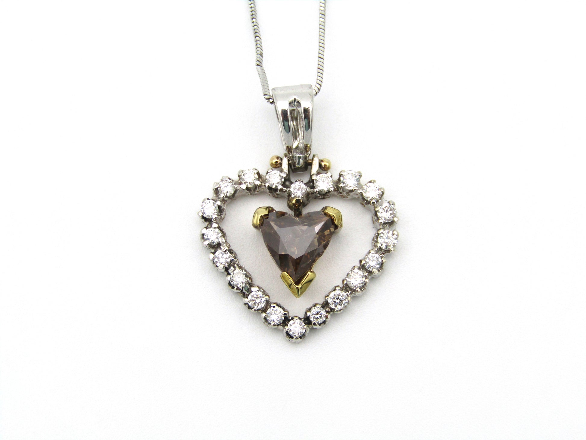 18kt gold cognac diamond pendant.