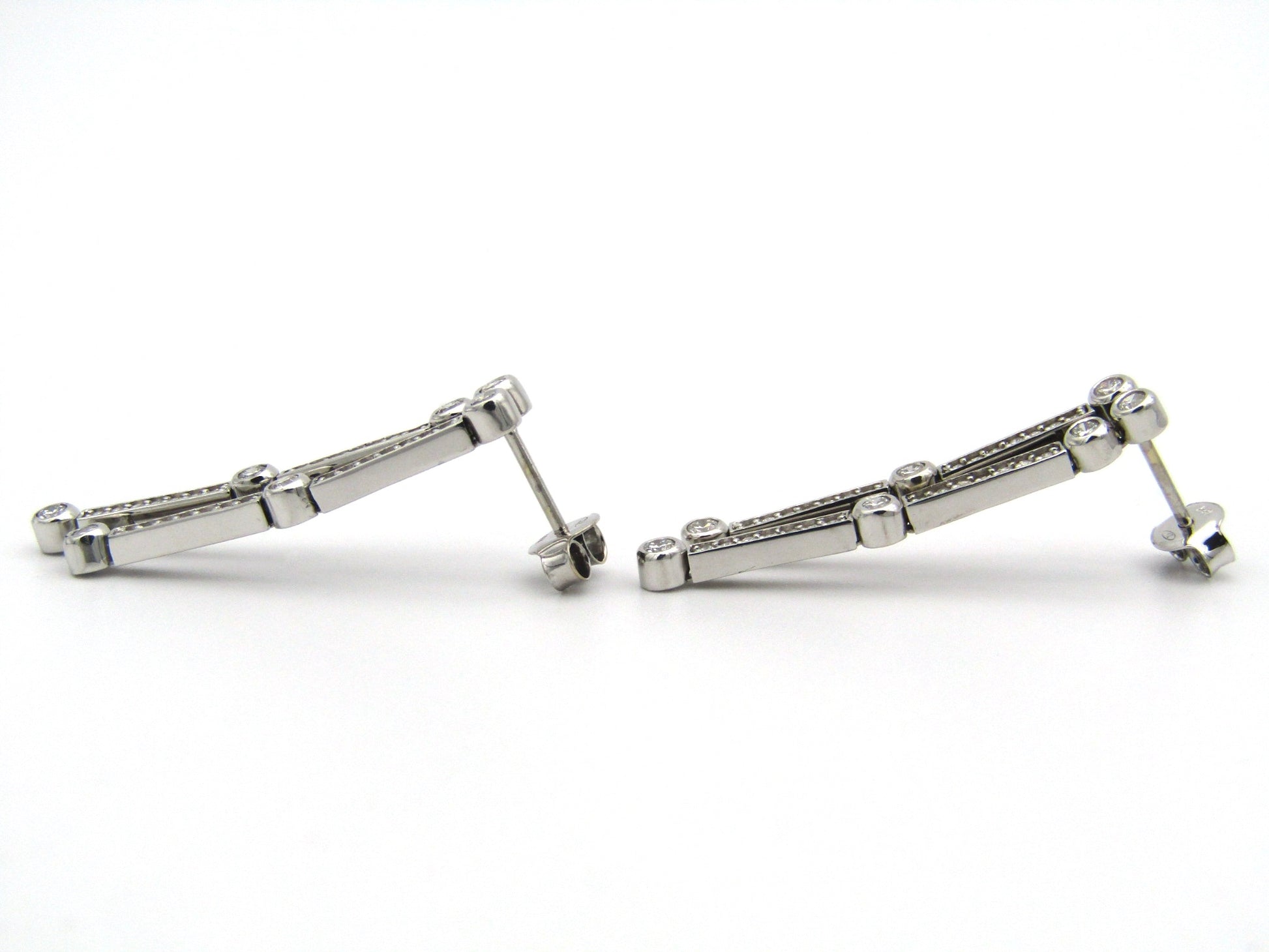 18K gold diamond drop earrings.