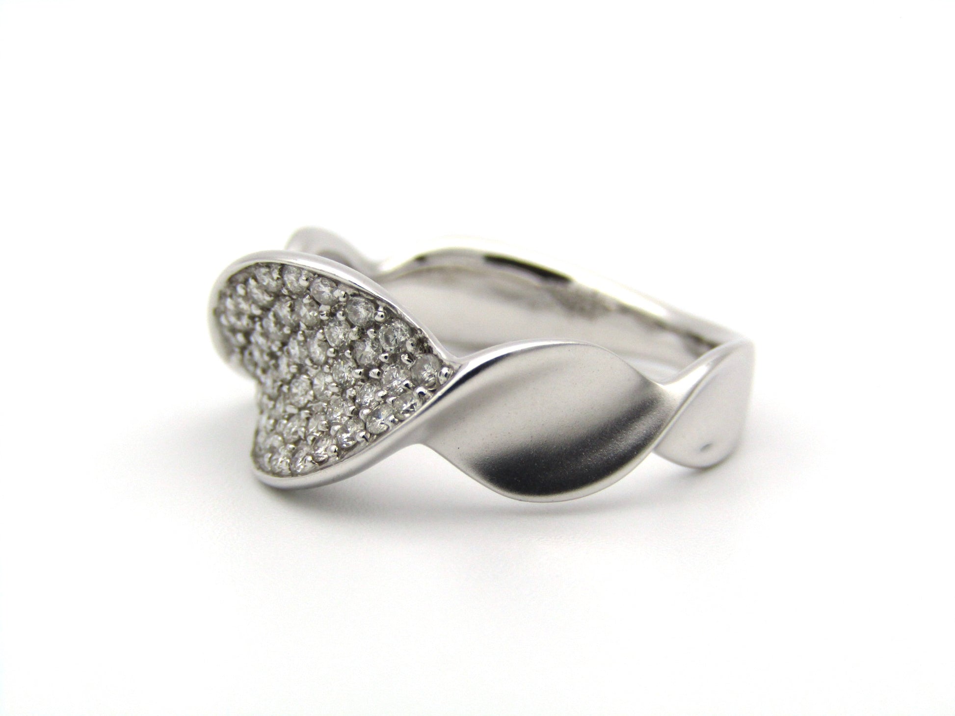 18K gold twist diamond ring.