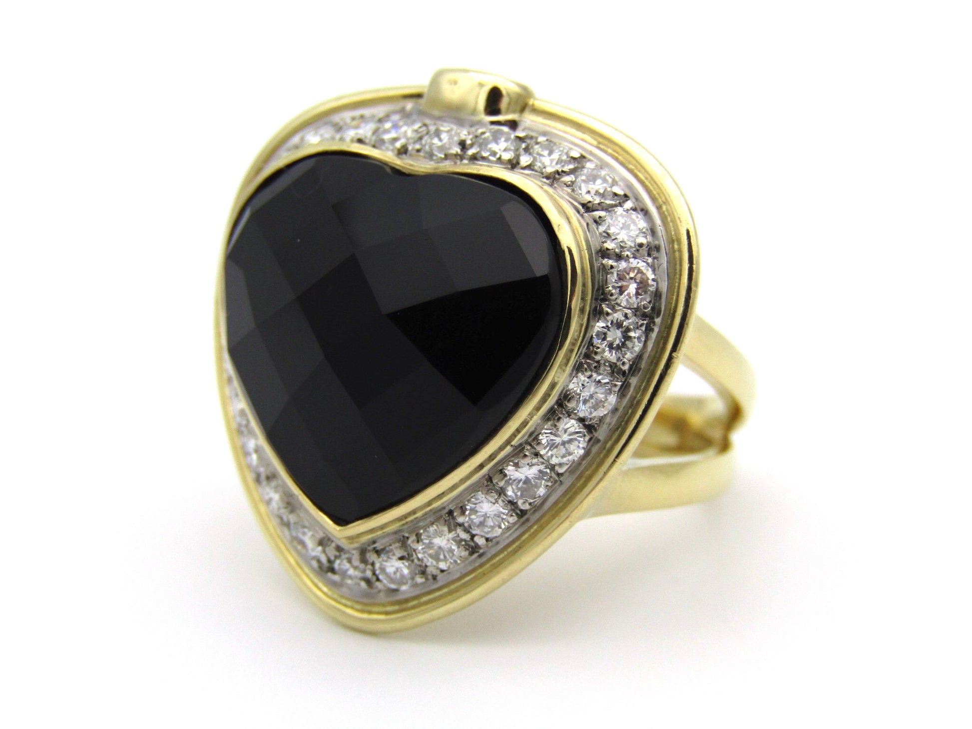 18kt gold amethyst, diamond, and ruby ring.