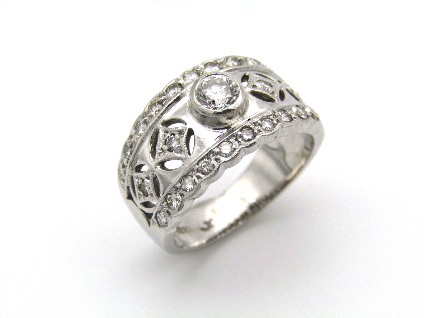18kt gold diamond ring by Jenna Clifford.