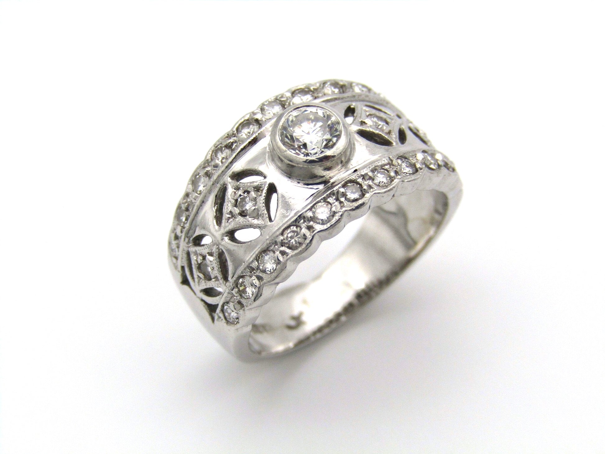 18kt gold diamond ring by Jenna Clifford.