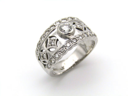 18kt gold diamond ring by Jenna Clifford.