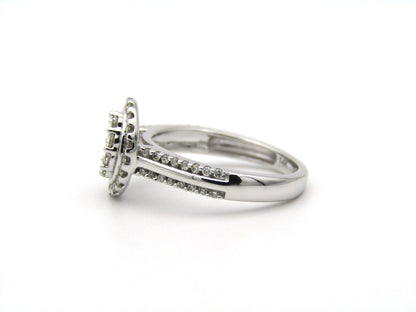 14K gold diamond ring.