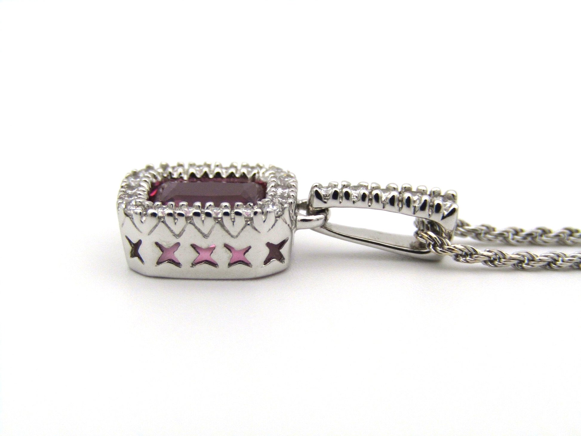 14kt white gold Pink Tourmaline and diamonds pendant.