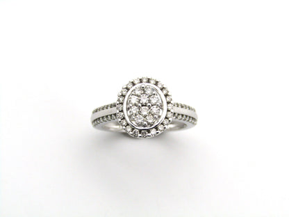 14K gold diamond ring.
