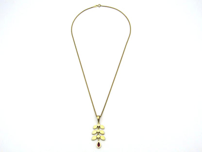 A Vintage 9K gold Almandine garnet and diamond pendant.